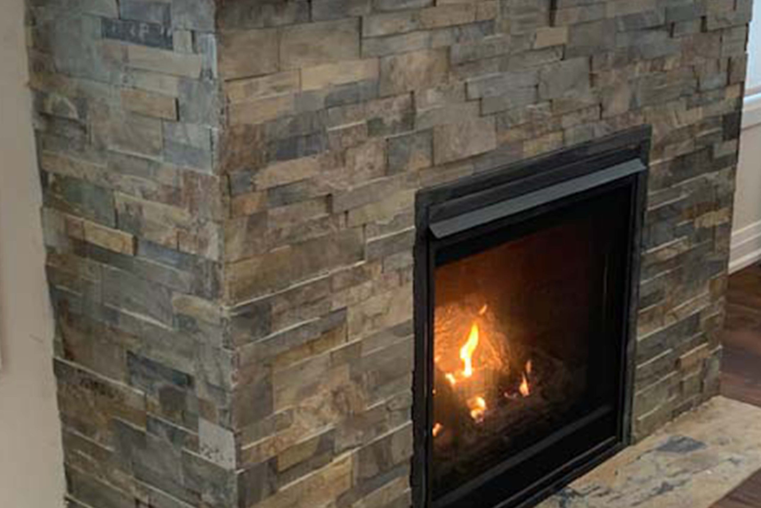 Warm & Cozy Dry Stack Stone Fireplace